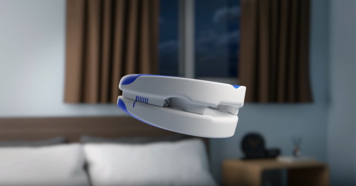 Close-up of VitalSleep custom-fit mouthpiece highlighting Accu-Adjust system
