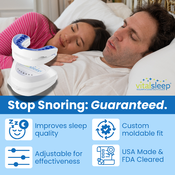couple in bed sleeping with man wearing anti snoring device