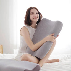 woman holding pillow