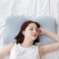 woman laying on a pillow